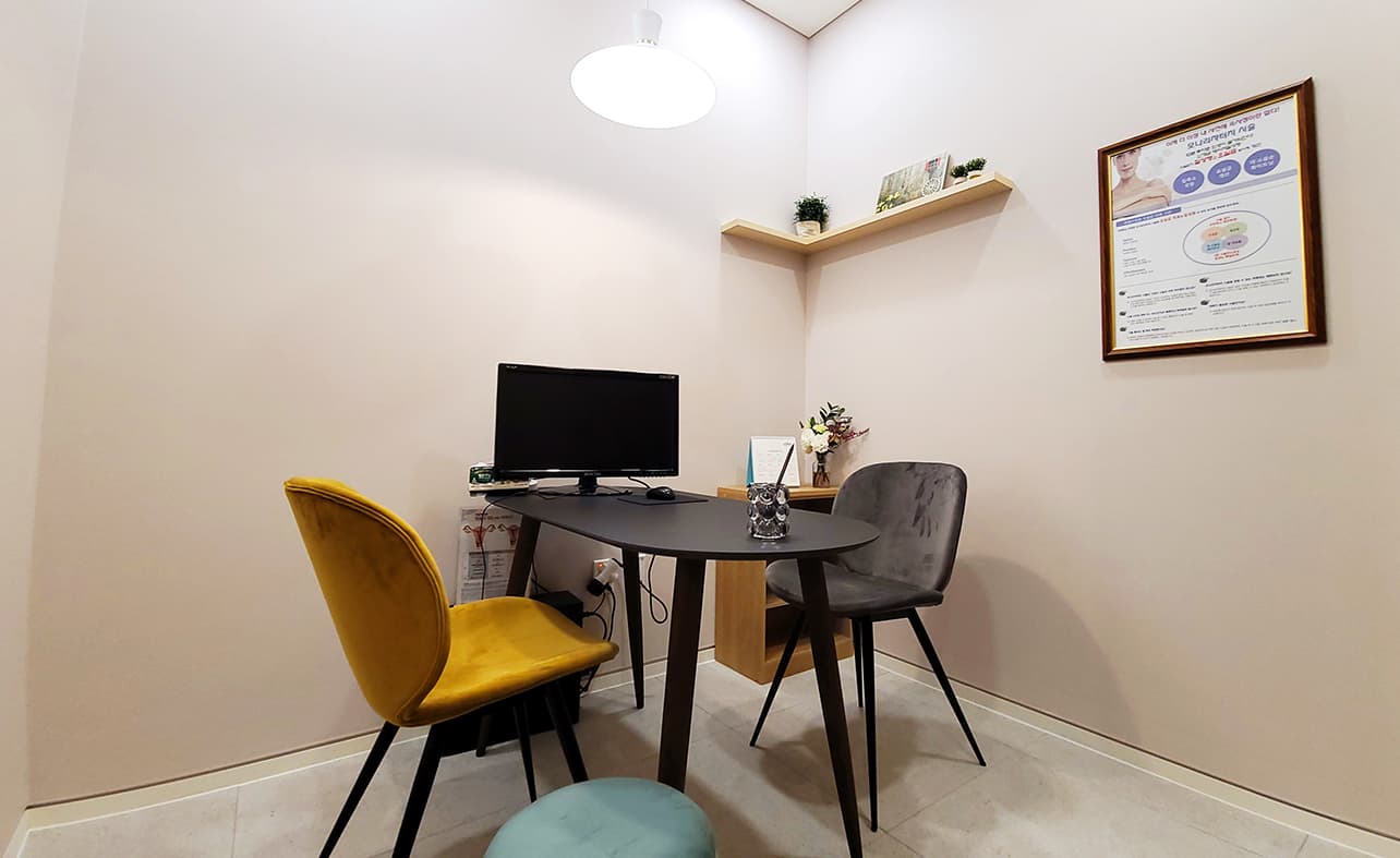 Private counseling room with a small table and chairs